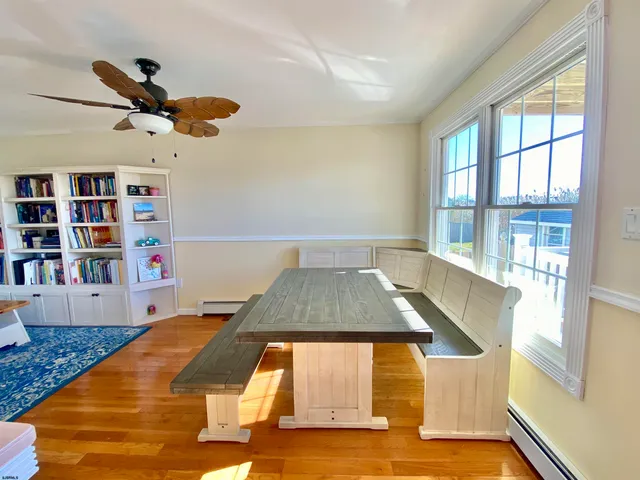 a kitchen with stainless steel appliances a refrigerator sink and cabinets
