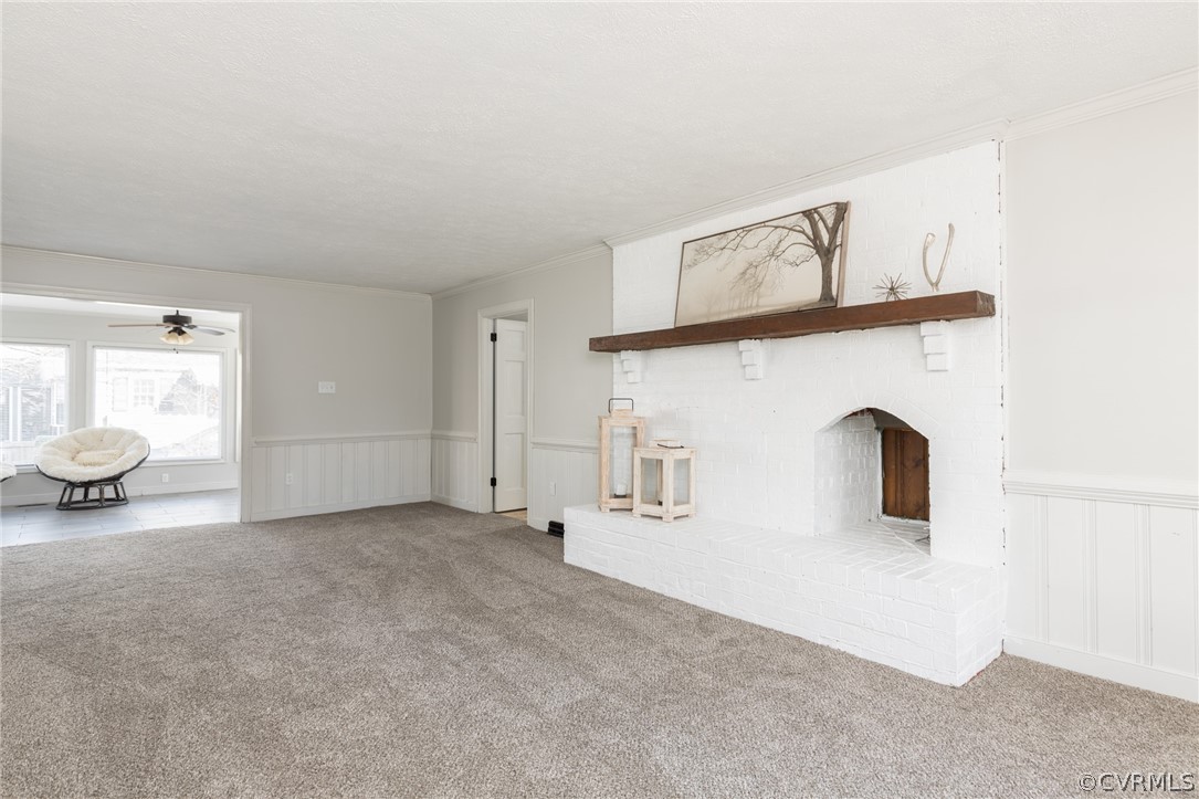 13812 Barnes Spring Road Midlothian, VA 23112 - Photo 3 of 50 a view of a livingroom with wooden floor and kitchen space