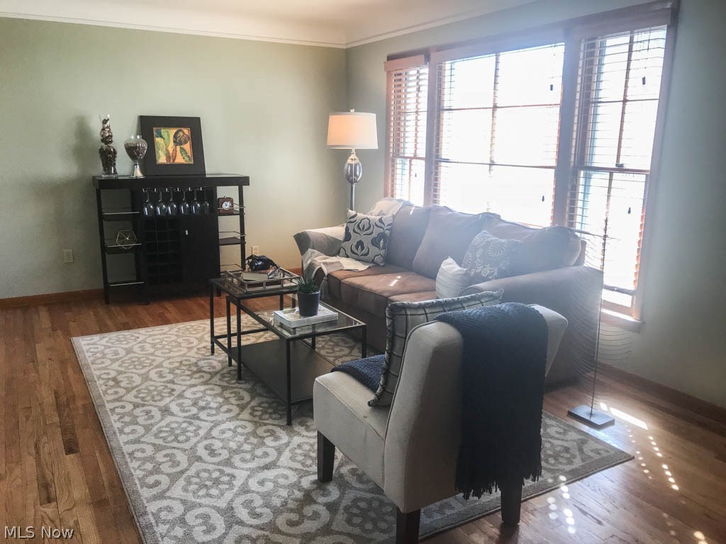 1159 Avondale Road Cleveland, OH 44121 - Photo 2 of 17 Sun-filled living room with hardwood flooring.