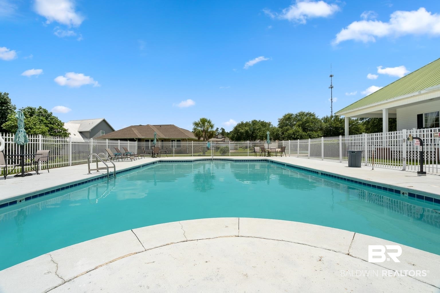 22764 Respite Lane Foley, AL 36535 - Photo 40 of 46 Community pool featuring a patio