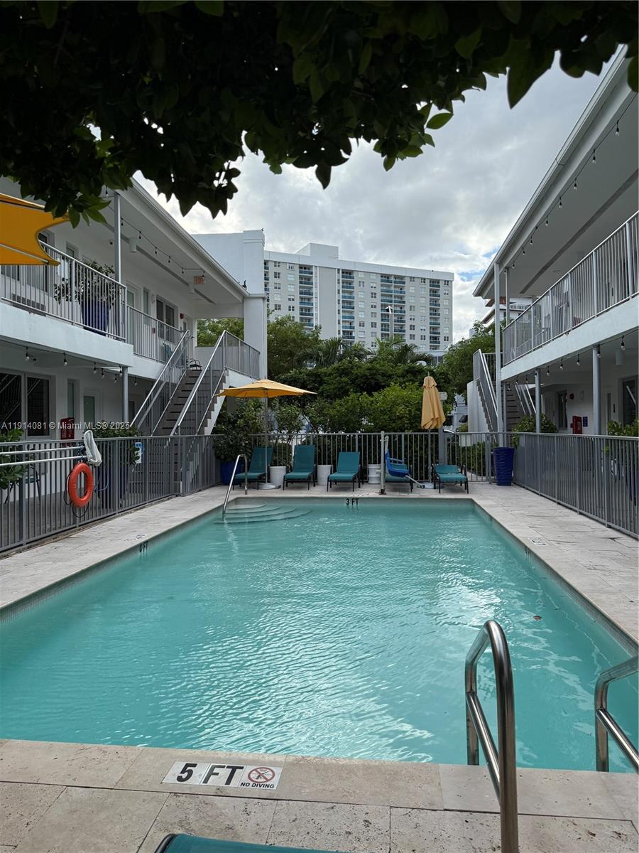 a view of outdoor space yard deck patio and swimming pool