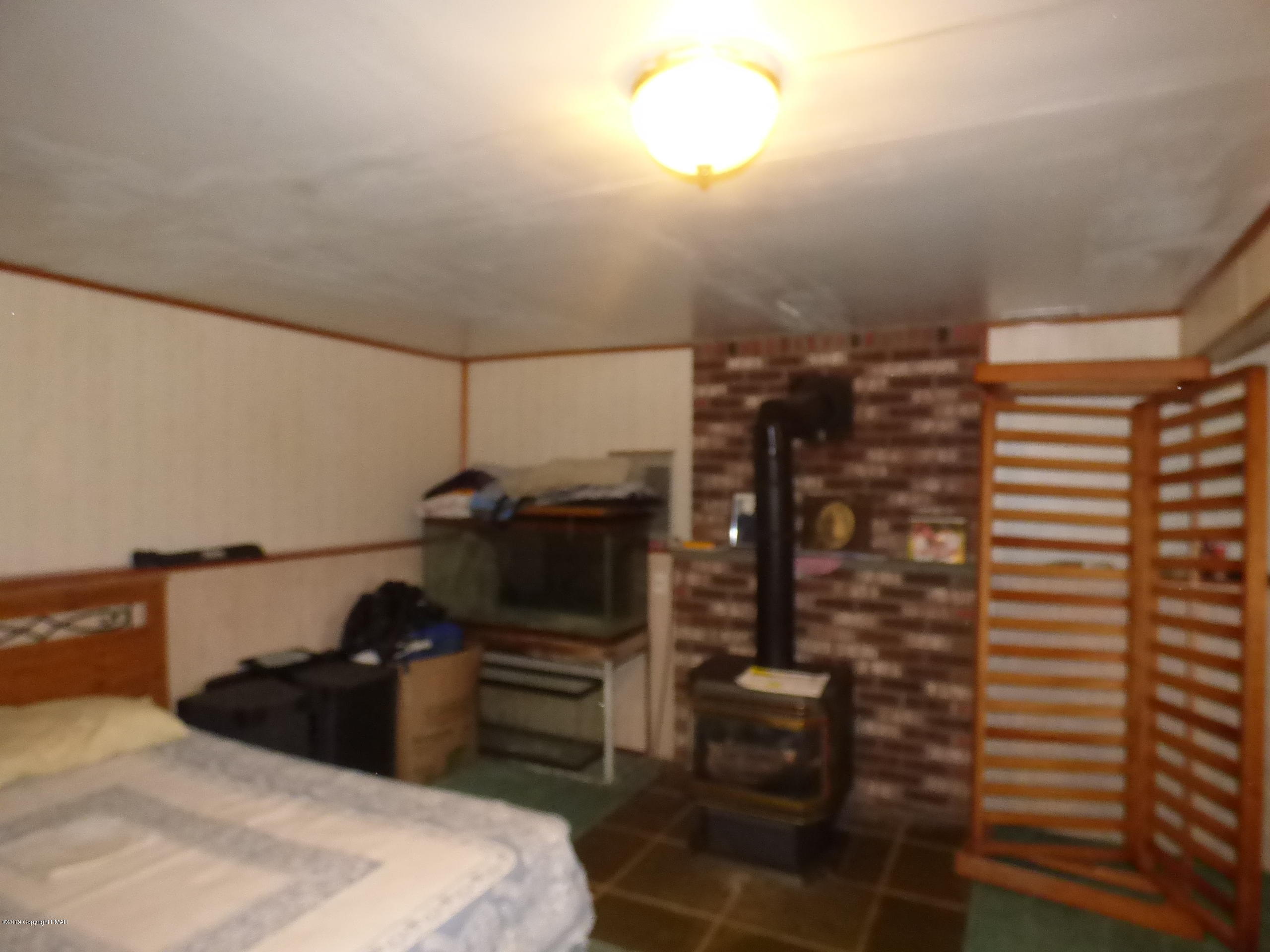 53 Whitaker Road Bushkill, PA 18324 - Photo 13 of 14 pellet stove