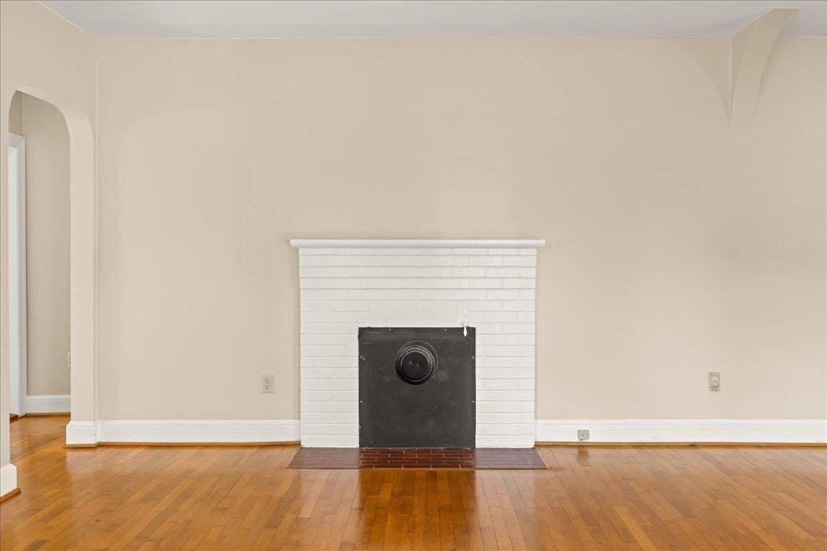 1439 Bluestone Street Harrisonburg, VA 22801 - Photo 13 of 34 a view of an empty room with wooden floor