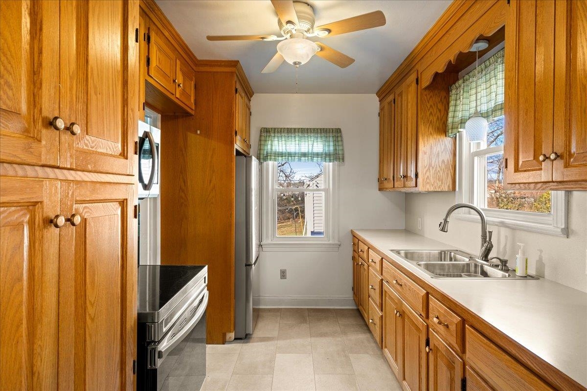 1439 Bluestone Street Harrisonburg, VA 22801 - Photo 15 of 34 a kitchen with a sink a counter top space and a window