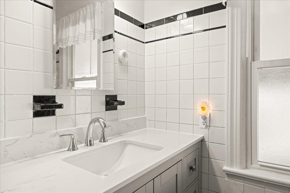 1439 Bluestone Street Harrisonburg, VA 22801 - Photo 22 of 34 a bathroom with a sink and a shower