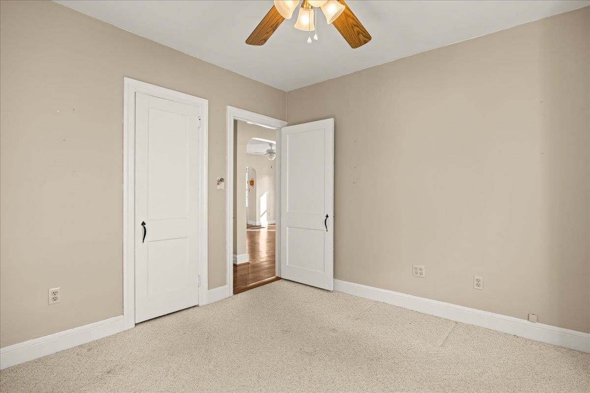1439 Bluestone Street Harrisonburg, VA 22801 - Photo 25 of 34 an empty room with a ceiling fan