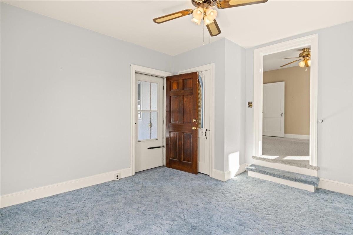 1439 Bluestone Street Harrisonburg, VA 22801 - Photo 26 of 34 an empty room with closet and a chandelier fan