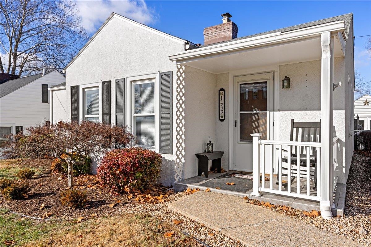1439 Bluestone Street Harrisonburg, VA 22801 - Photo 7 of 34 a view of a house with a small yard and plants