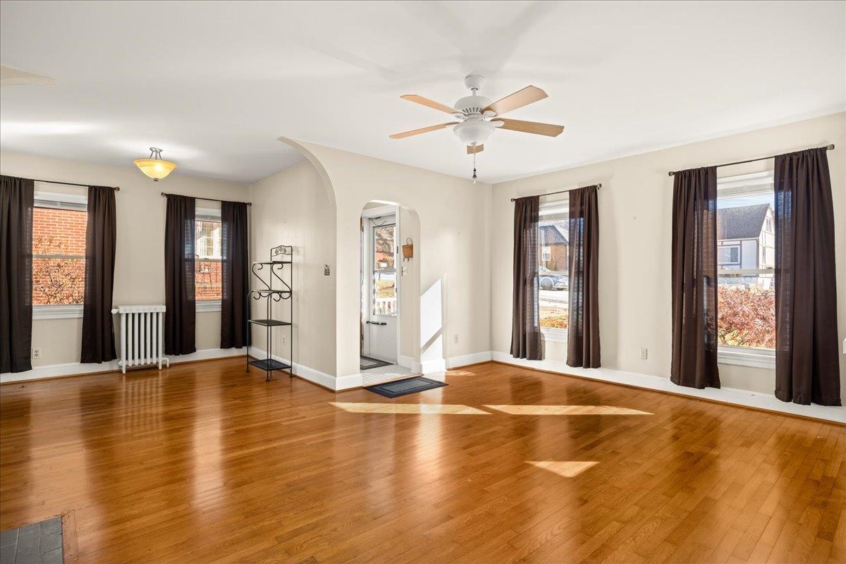1439 Bluestone Street Harrisonburg, VA 22801 - Photo 8 of 34 a view of an empty room with window and wooden floor