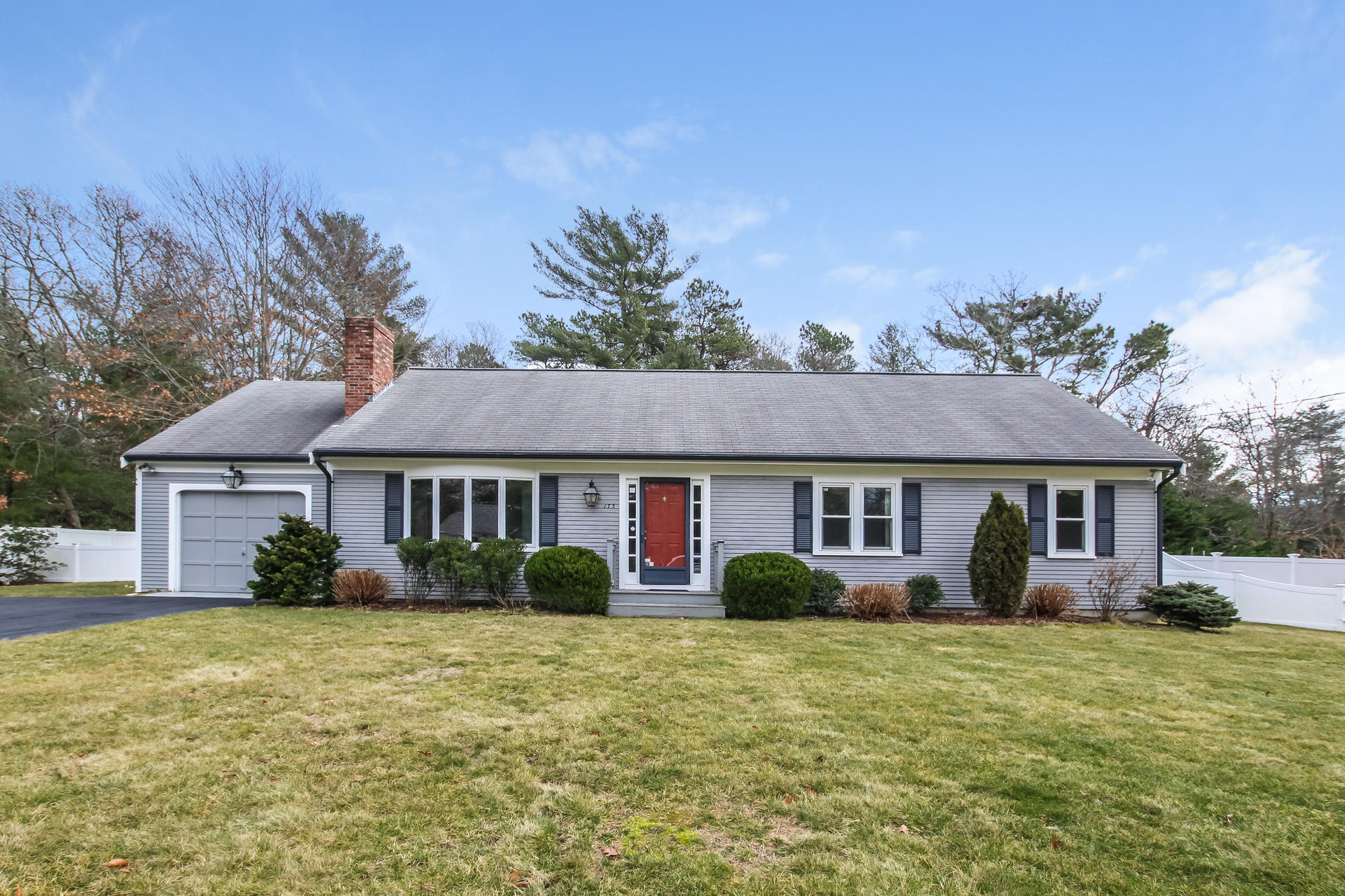 173 Rolling Hitch Road Centerville, MA 02632 - Photo 1 of 22 front view of house with a yard