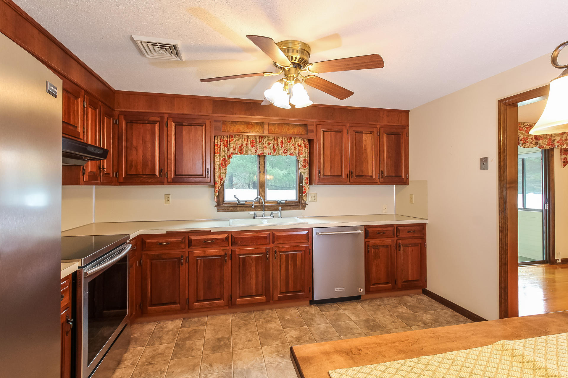 173 Rolling Hitch Road Centerville, MA 02632 - Photo 12 of 22 a kitchen with a sink cabinets and window