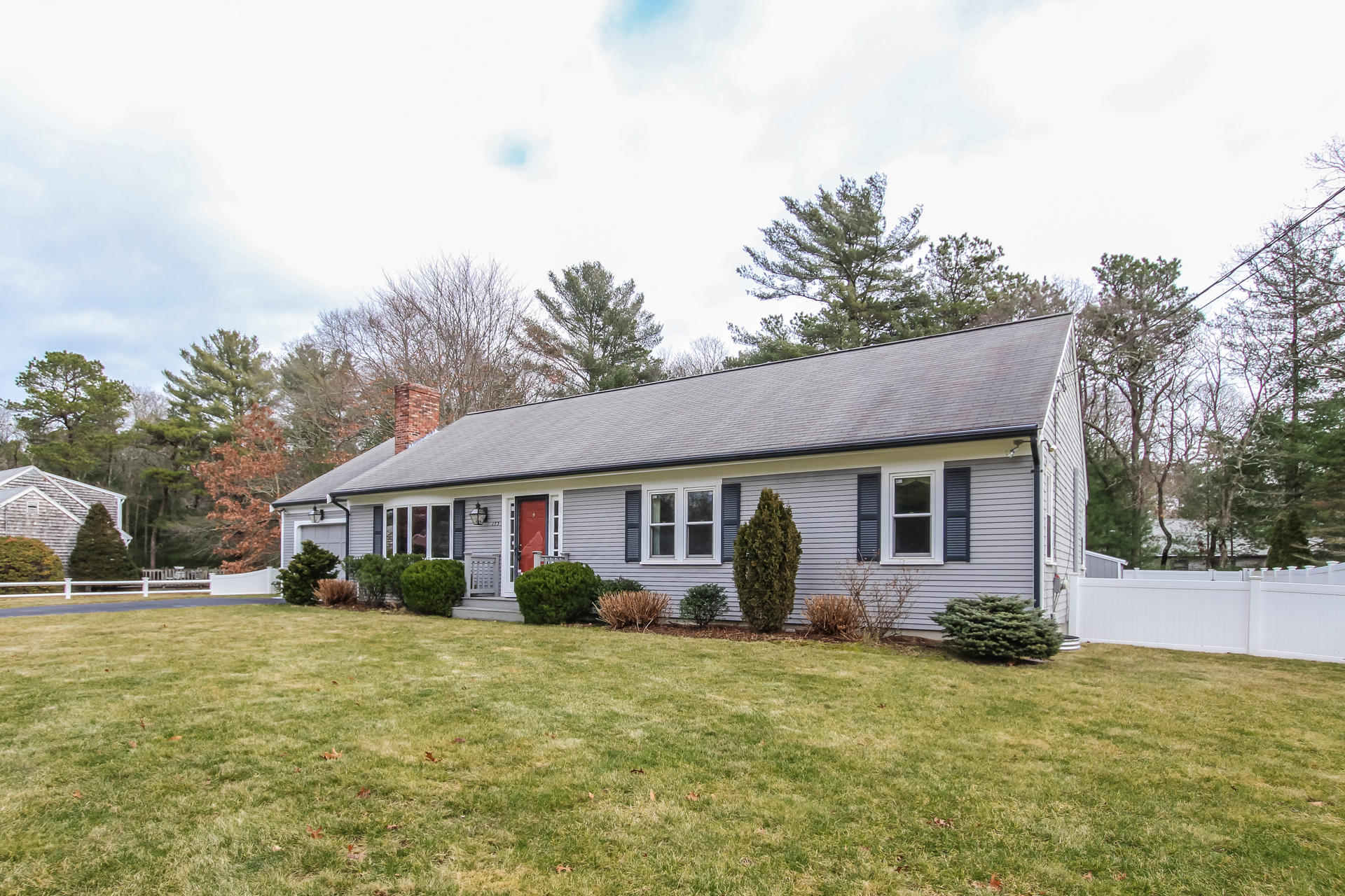 173 Rolling Hitch Road Centerville, MA 02632 - Photo 3 of 22 a front view of house with yard and green space
