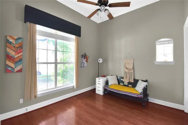 a living room with furniture and a window