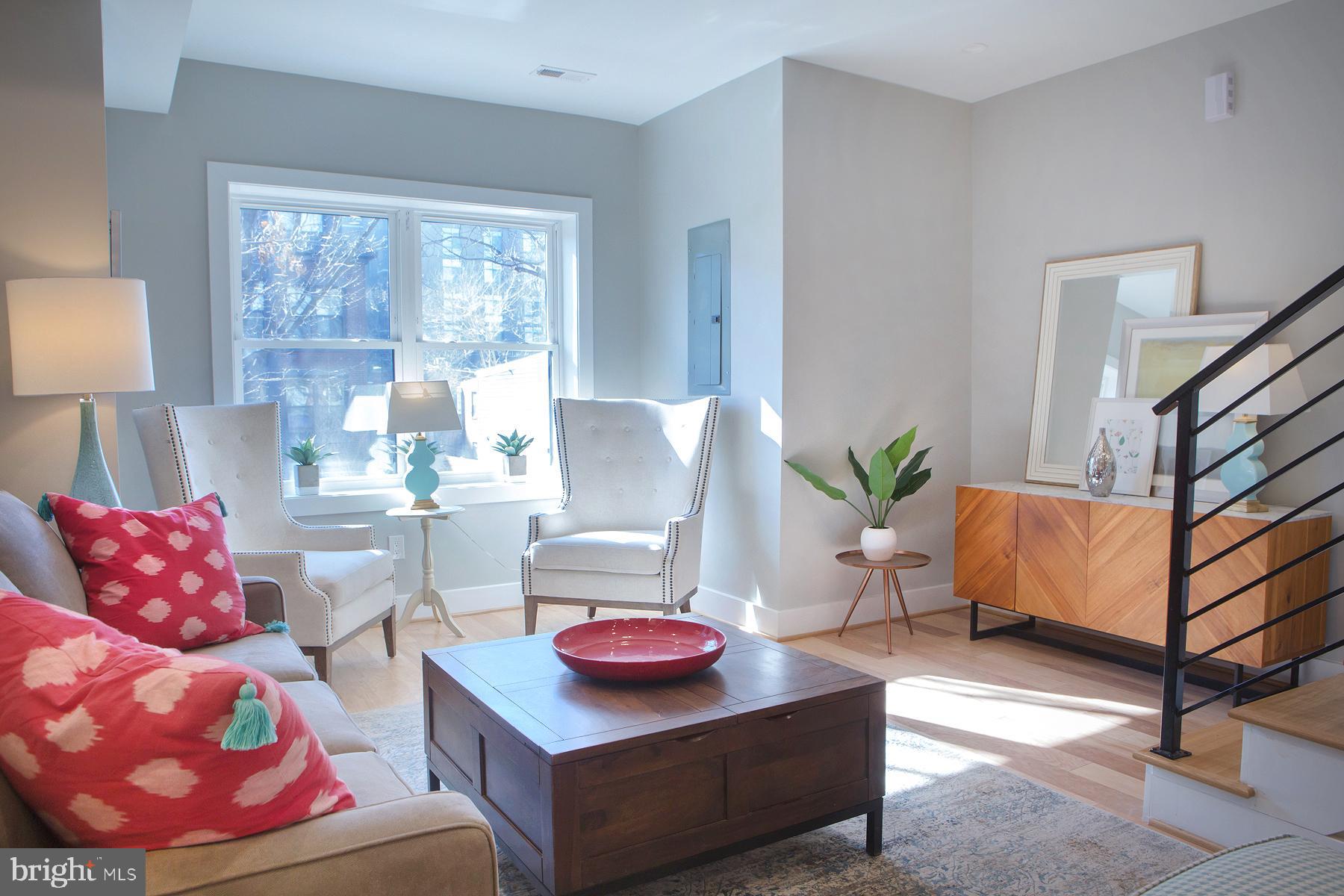 614 I Street Northeast, Unit 2 Washington, DC 20002 - Photo 2 of 48 Living Room, Picture Windows Hardwood Floors
