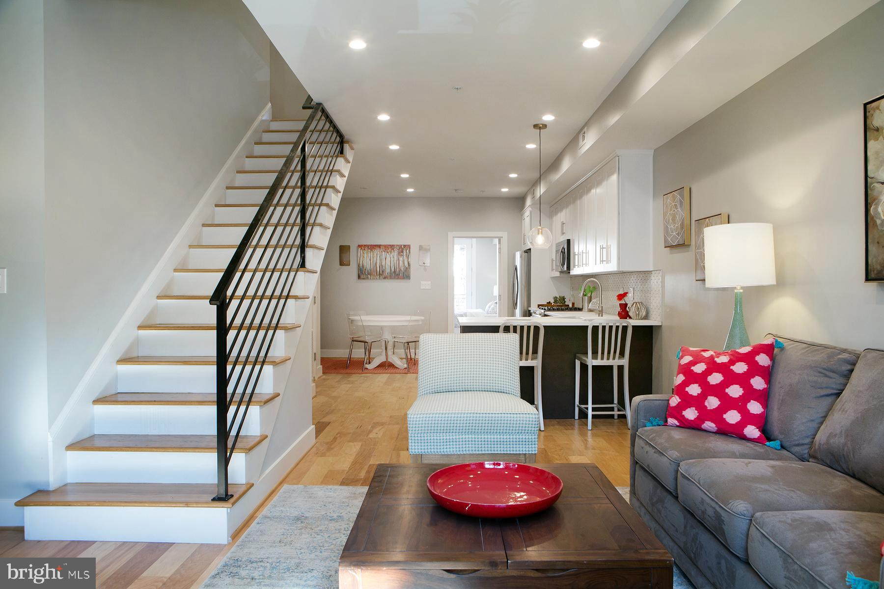 614 I Street Northeast, Unit 2 Washington, DC 20002 - Photo 5 of 48 Living Room, Picture Windows Hardwood Floors