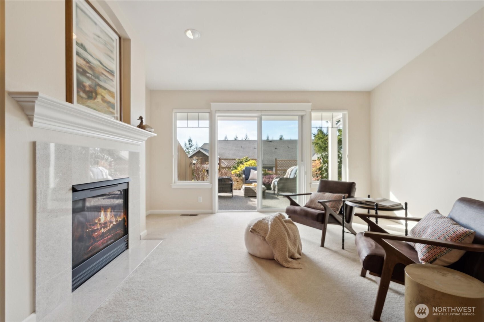 160 East Soderberg Road, Unit N38 Allyn, WA 98524 - Photo 12 of 29 a living room with furniture and a fireplace