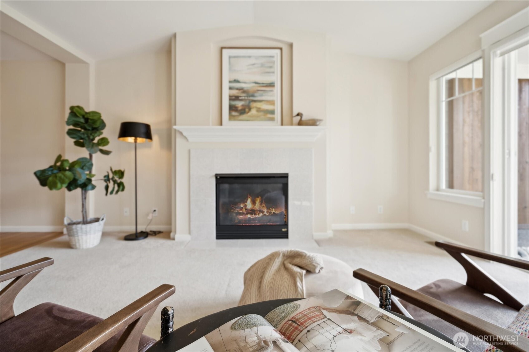 160 East Soderberg Road, Unit N38 Allyn, WA 98524 - Photo 13 of 29 a living room with furniture fireplace and wooden floor