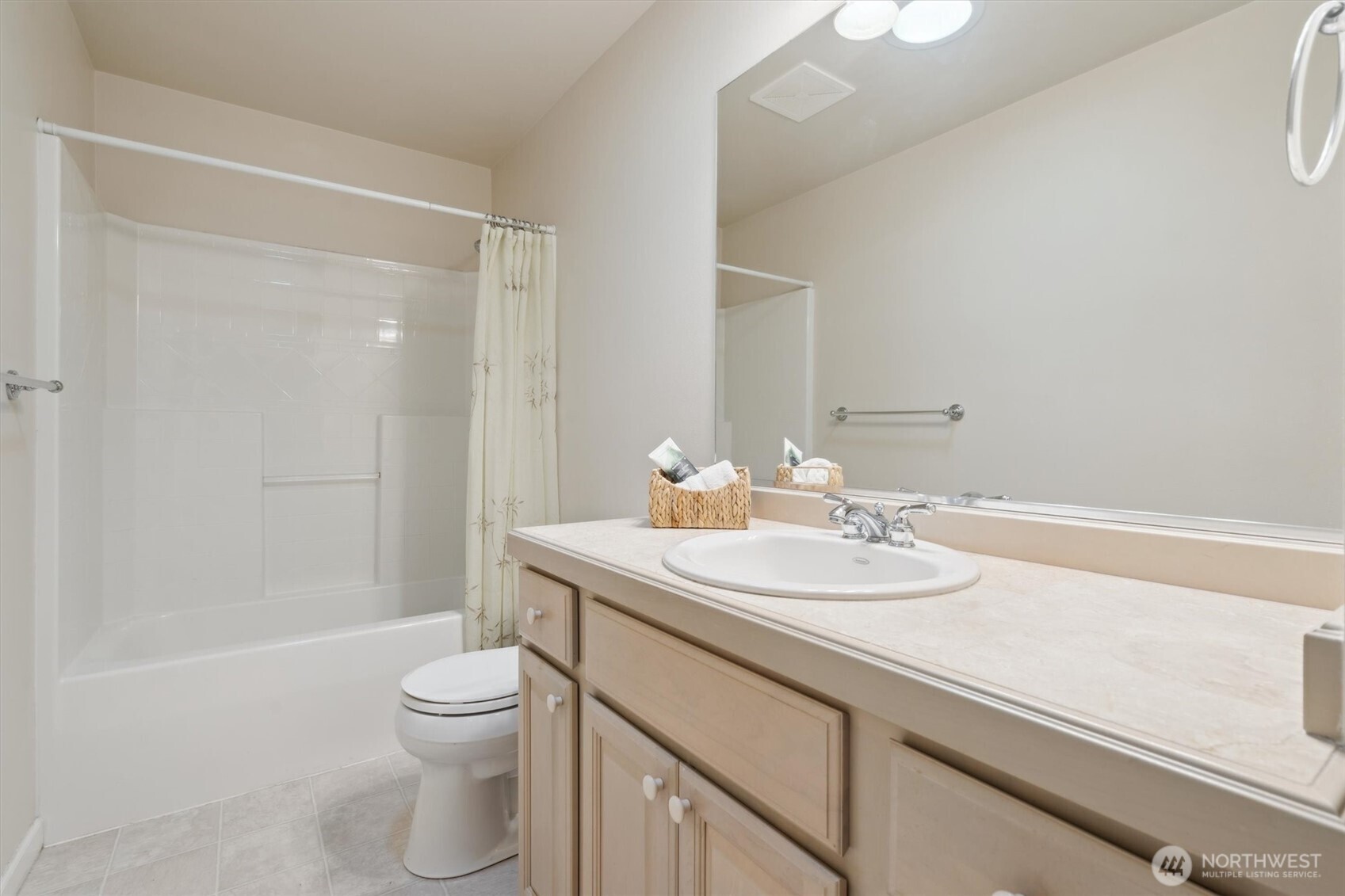 160 East Soderberg Road, Unit N38 Allyn, WA 98524 - Photo 23 of 29 a bathroom with a sink a toilet and shower