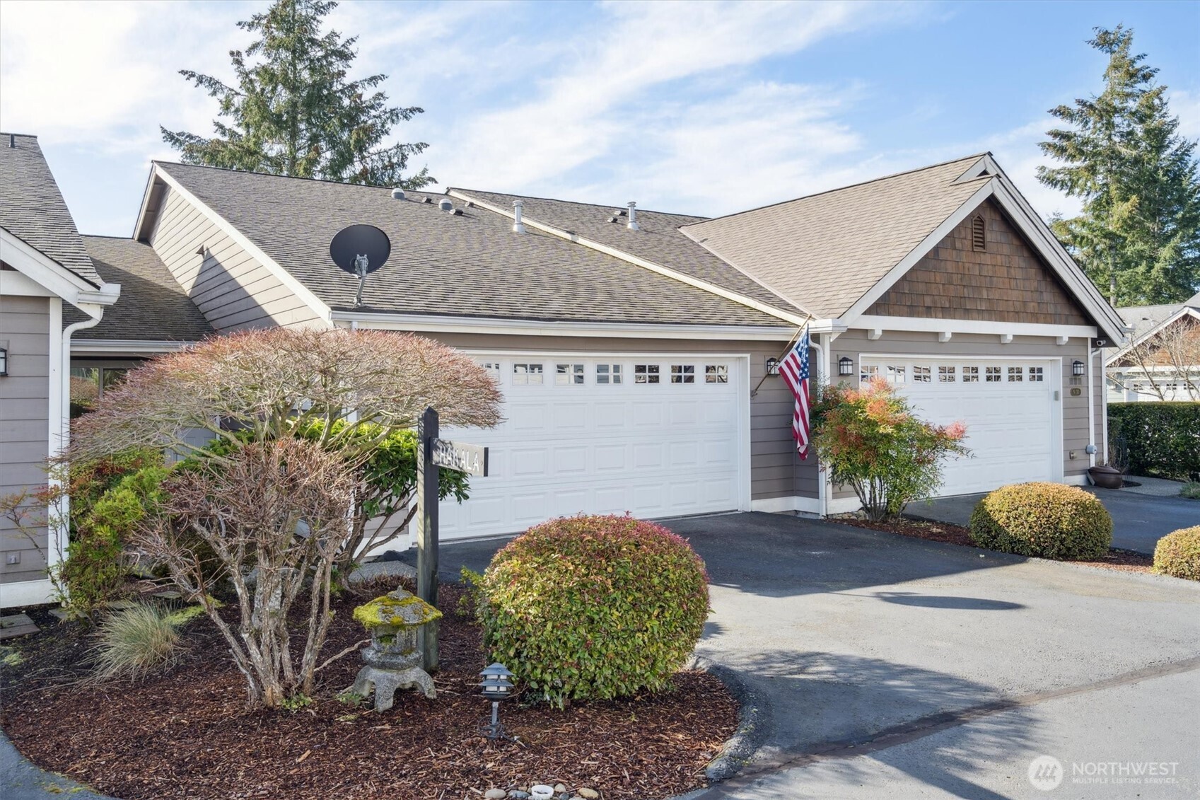 160 East Soderberg Road, Unit N38 Allyn, WA 98524 - Photo 29 of 29 a front view of a house with garden