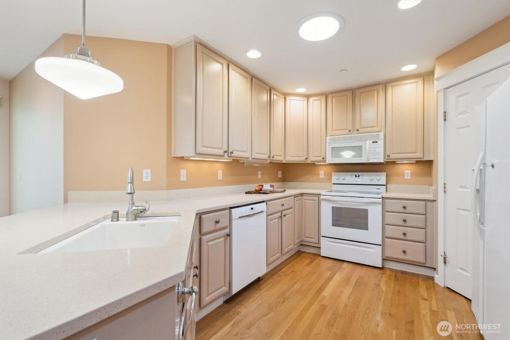 160 East Soderberg Road, Unit N38 Allyn, WA 98524 - Photo 3 of 29 a kitchen with a sink cabinets and window