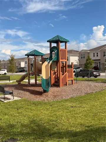a view of a yard with a slide