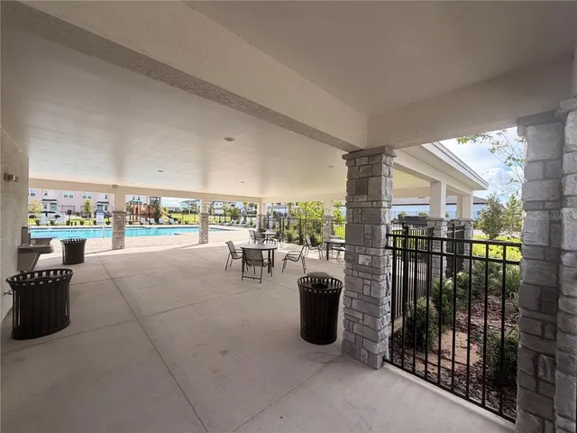 a view of a living room and balcony