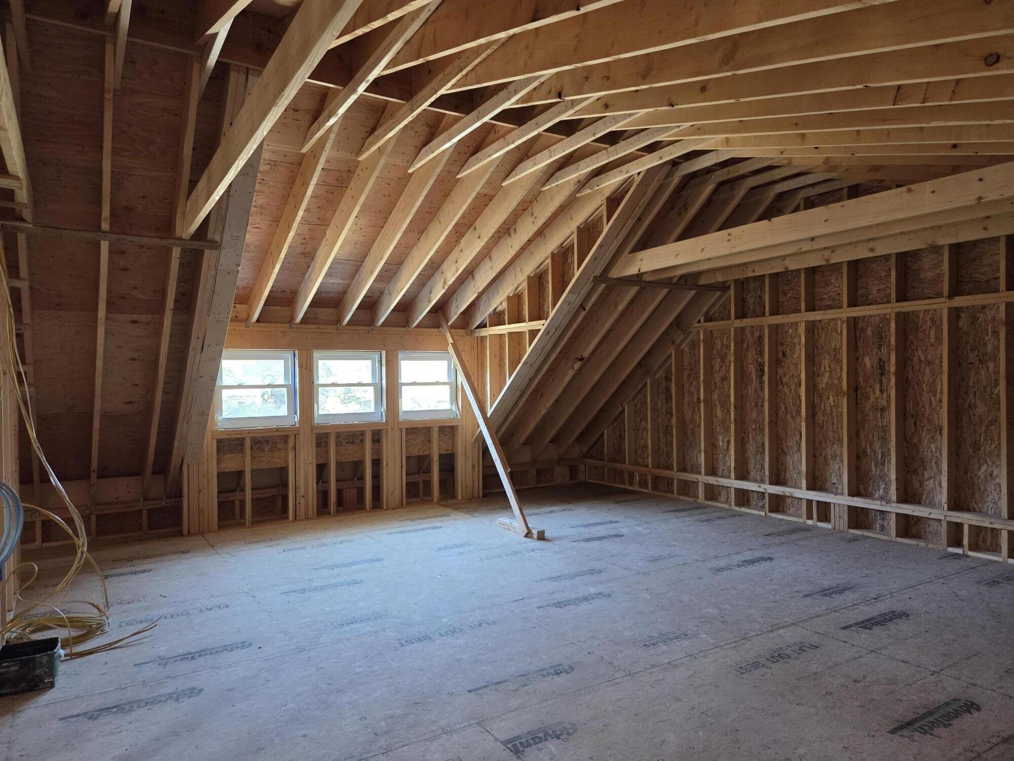 135 Sisson Road Harwich Port, MA 02646 - Photo 13 of 23 a view of an empty room with wooden floor and windows