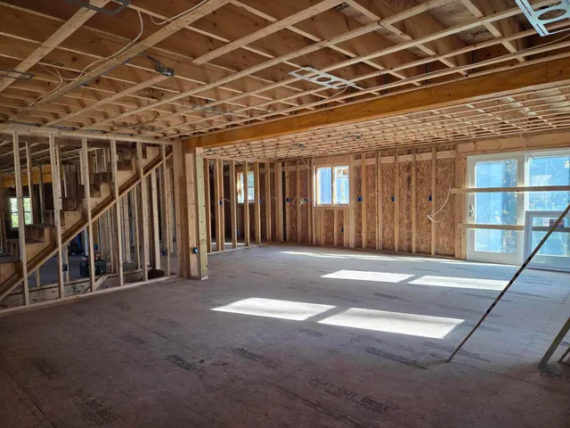 a view of livingroom with furniture and a window