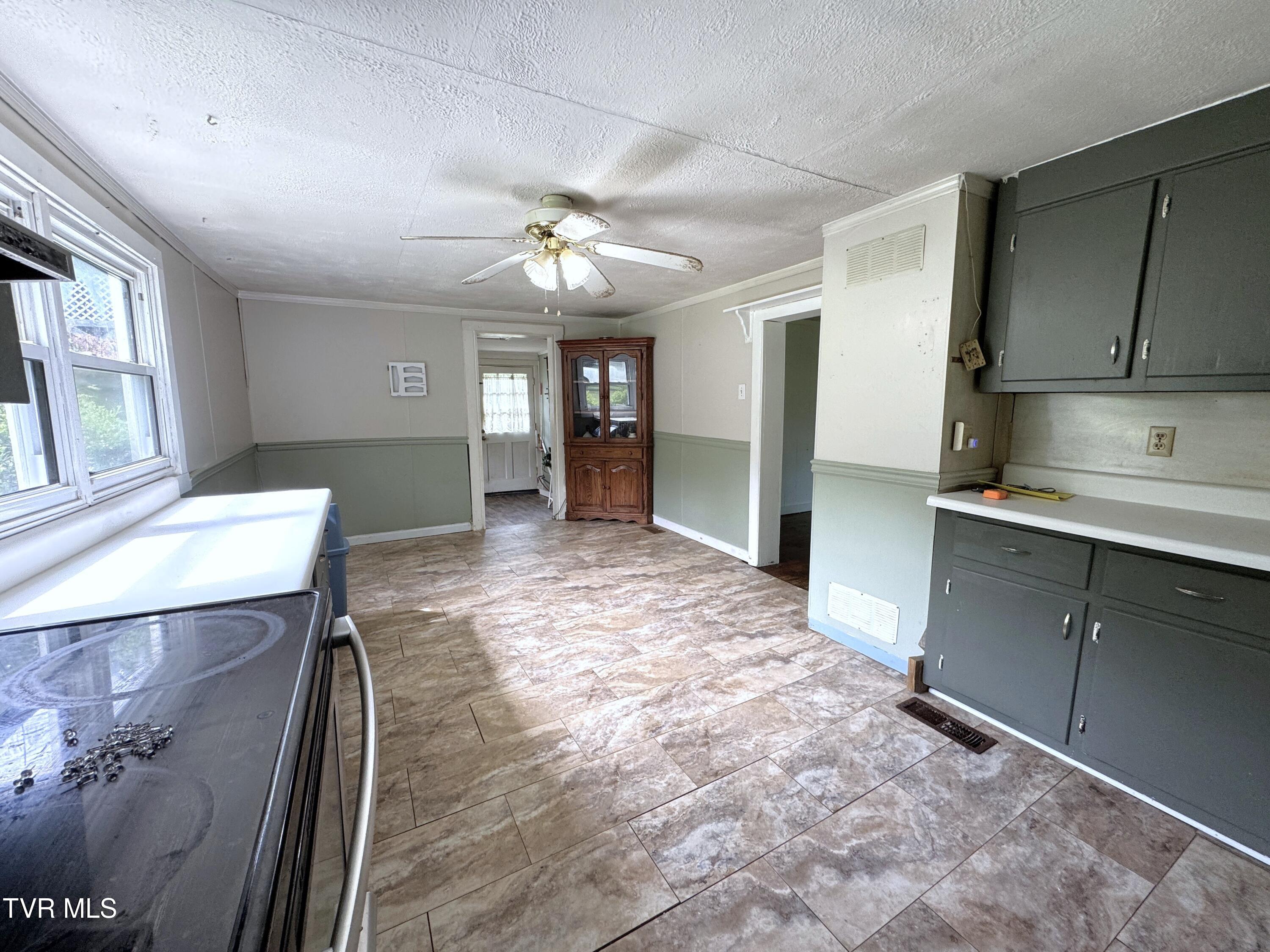 142 Sheryl Turner Road Big Stone Gap, VA 24219 - Photo 22 of 42 KITCHEN TOWARD MUD ROOM