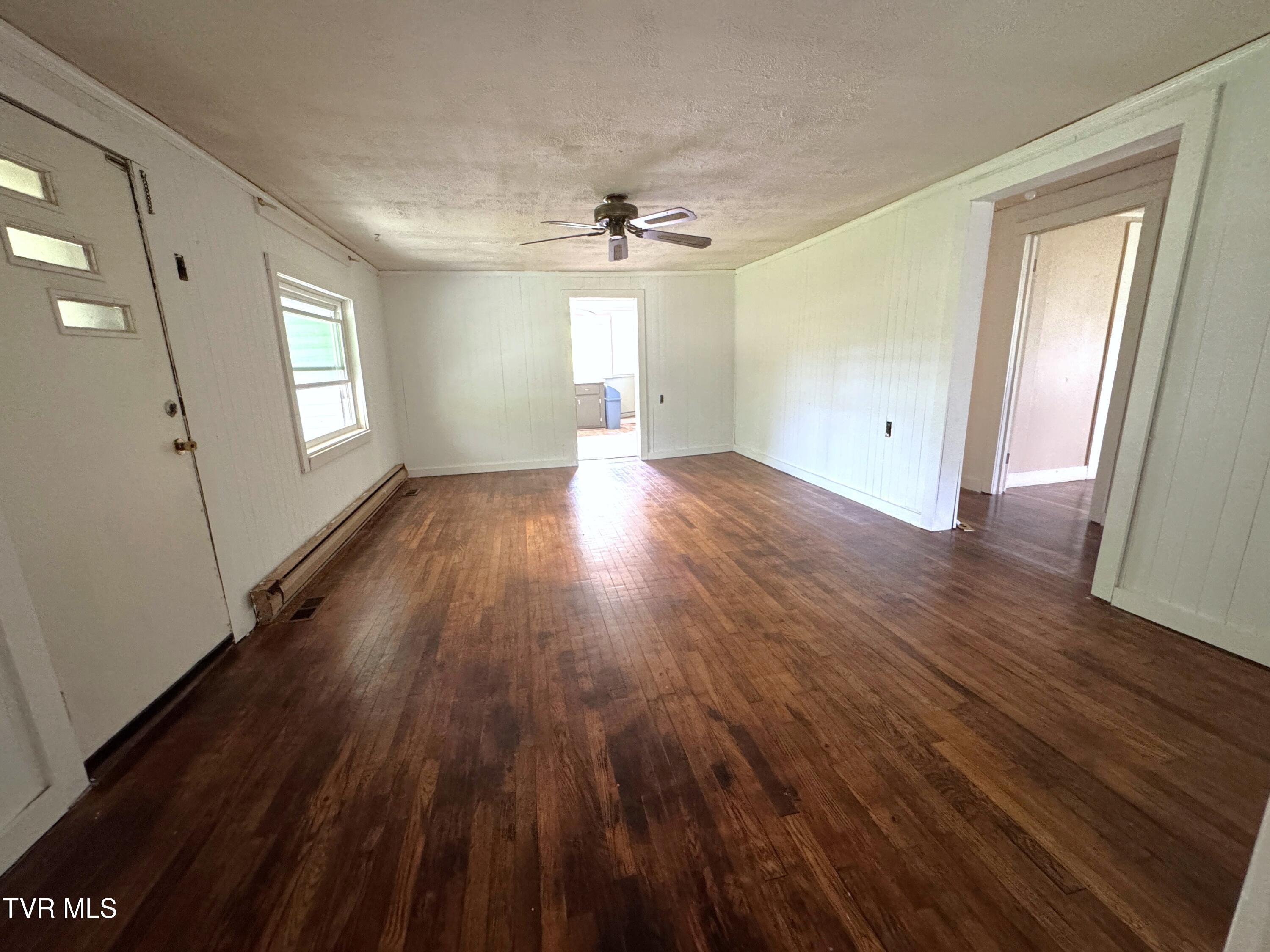 142 Sheryl Turner Road Big Stone Gap, VA 24219 - Photo 25 of 42 LIVING ROOM TOWARD KITCHEN