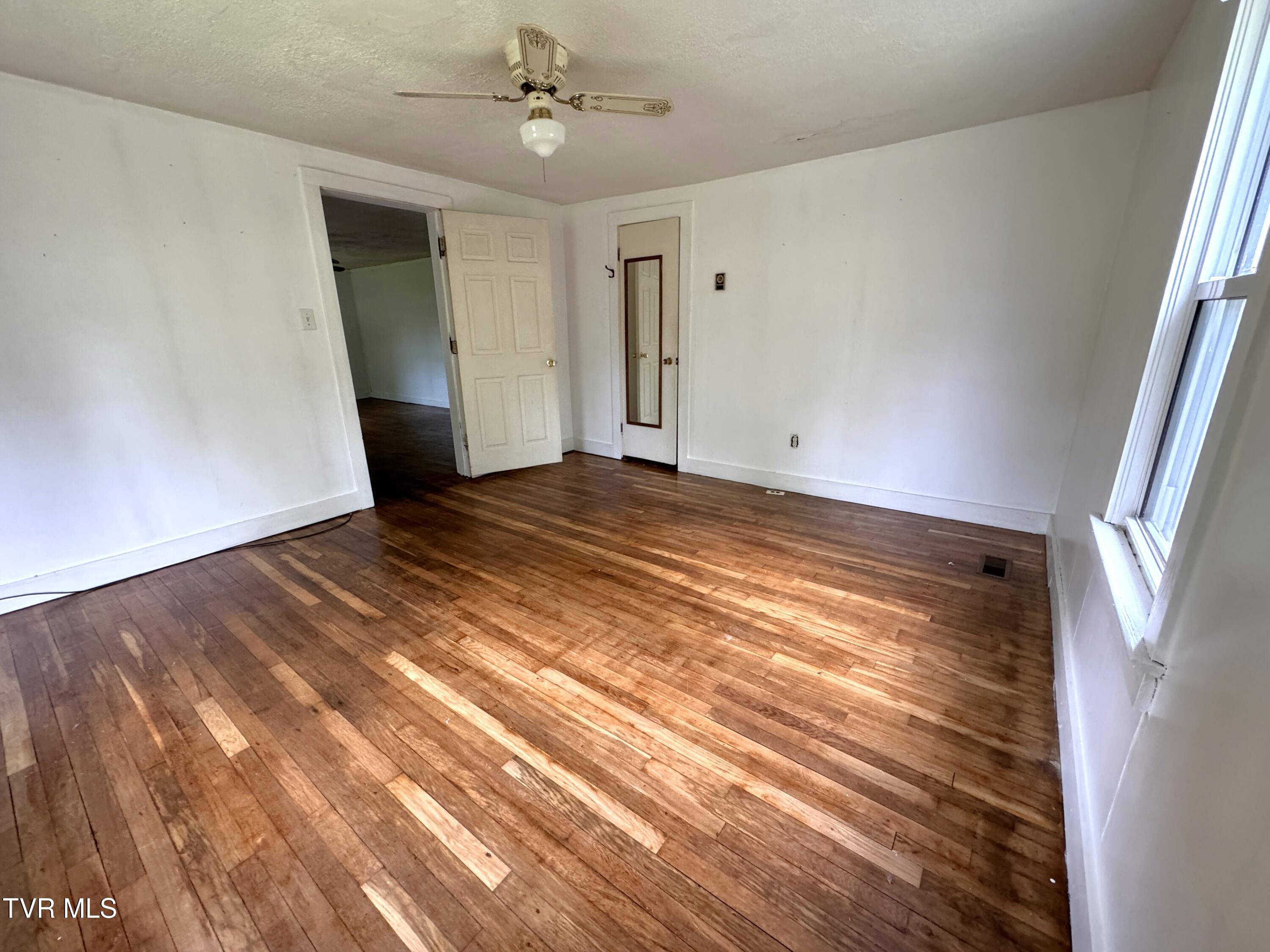 142 Sheryl Turner Road Big Stone Gap, VA 24219 - Photo 28 of 42 BEDROOM 1 TOWARD HALLWAY
