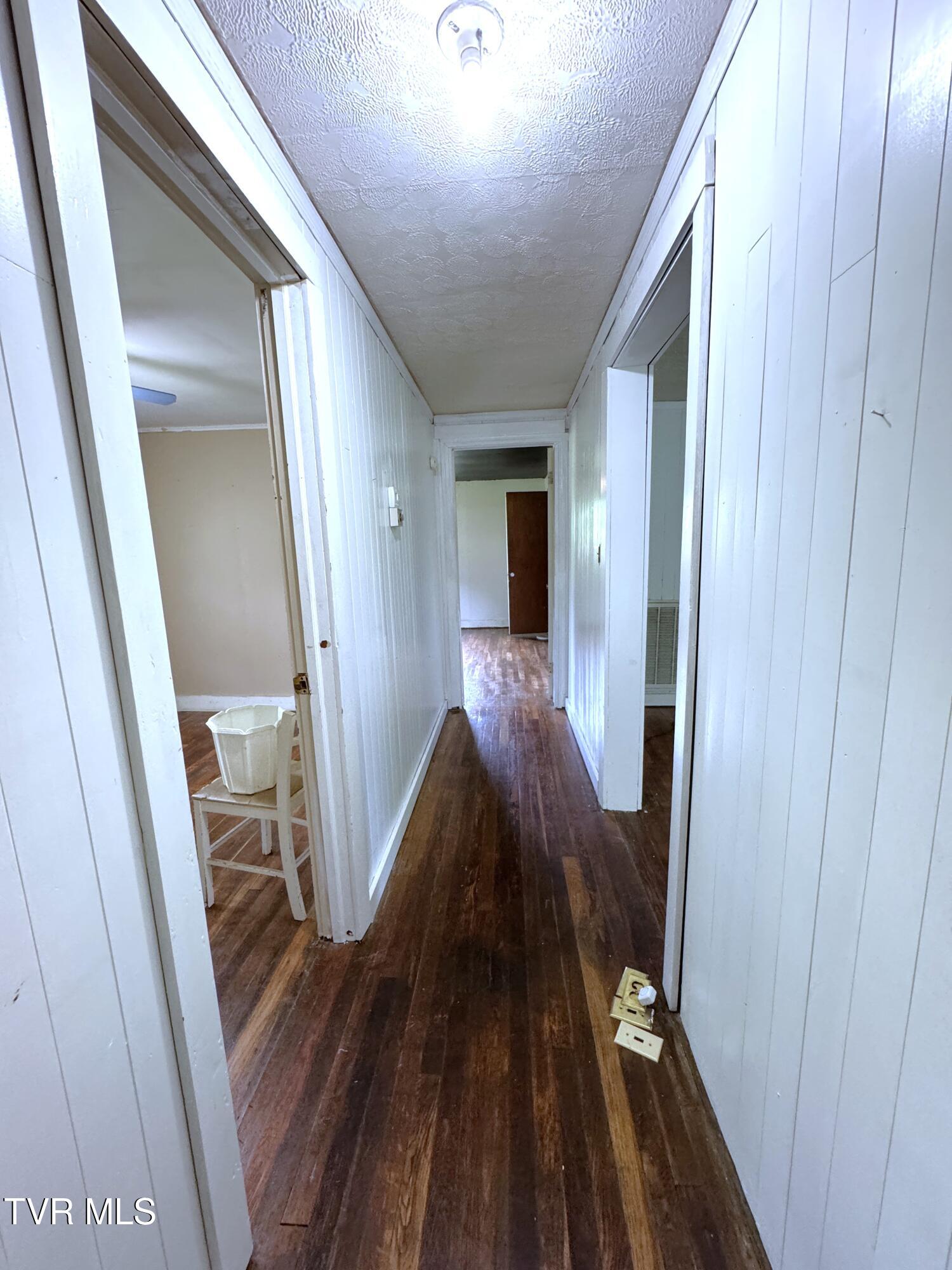 142 Sheryl Turner Road Big Stone Gap, VA 24219 - Photo 29 of 42 LIVING ROOM TOWARD BEDROOM 2