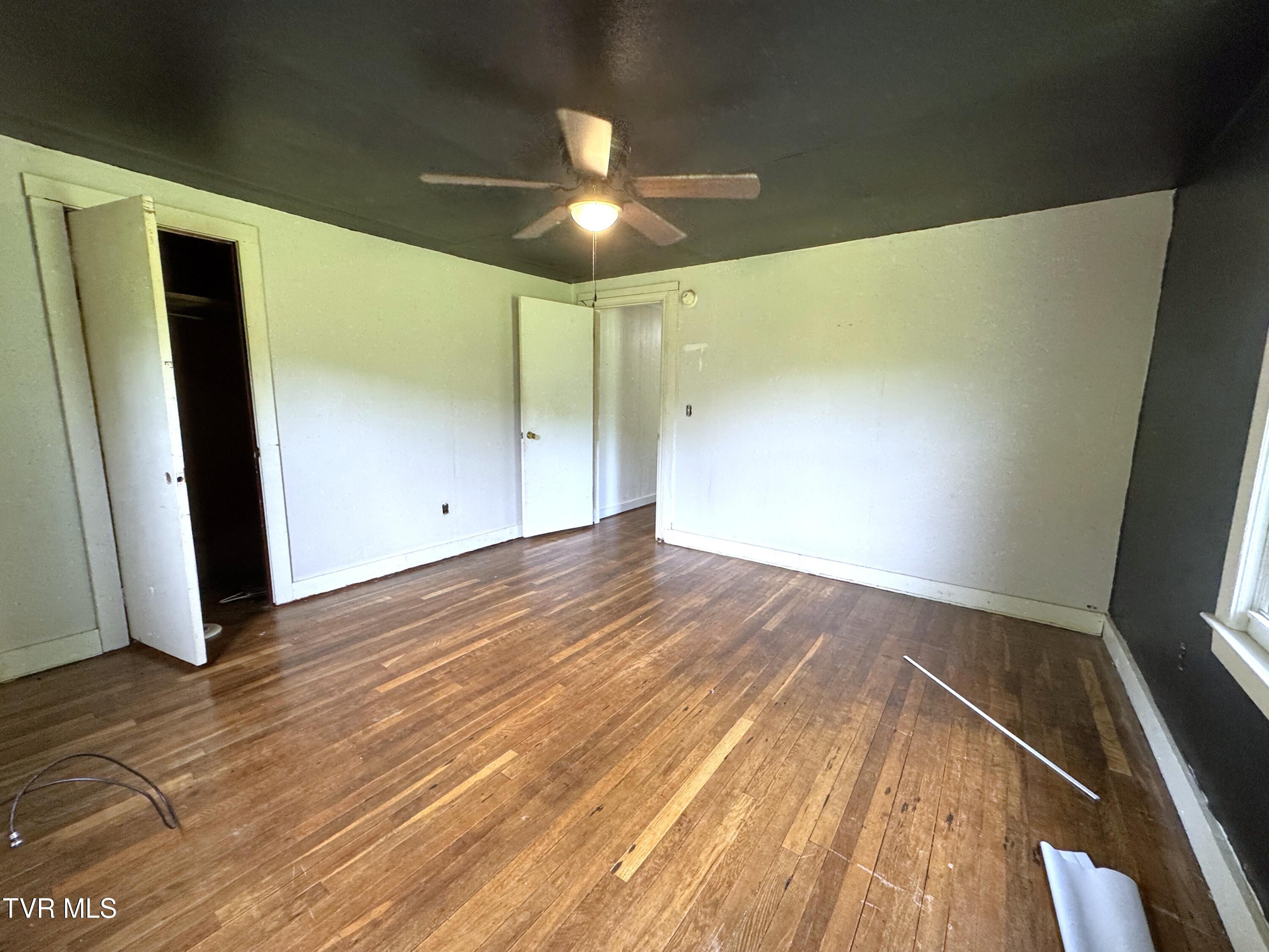 142 Sheryl Turner Road Big Stone Gap, VA 24219 - Photo 31 of 42 BEDROOM 2 TOWARD HALLWAY