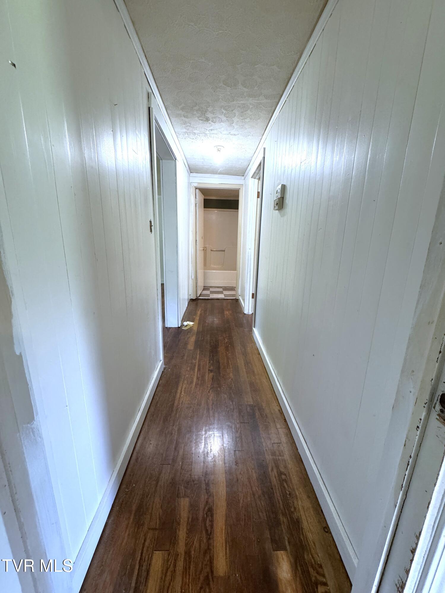 142 Sheryl Turner Road Big Stone Gap, VA 24219 - Photo 32 of 42 HALLWAY TOWARD BATHROOM