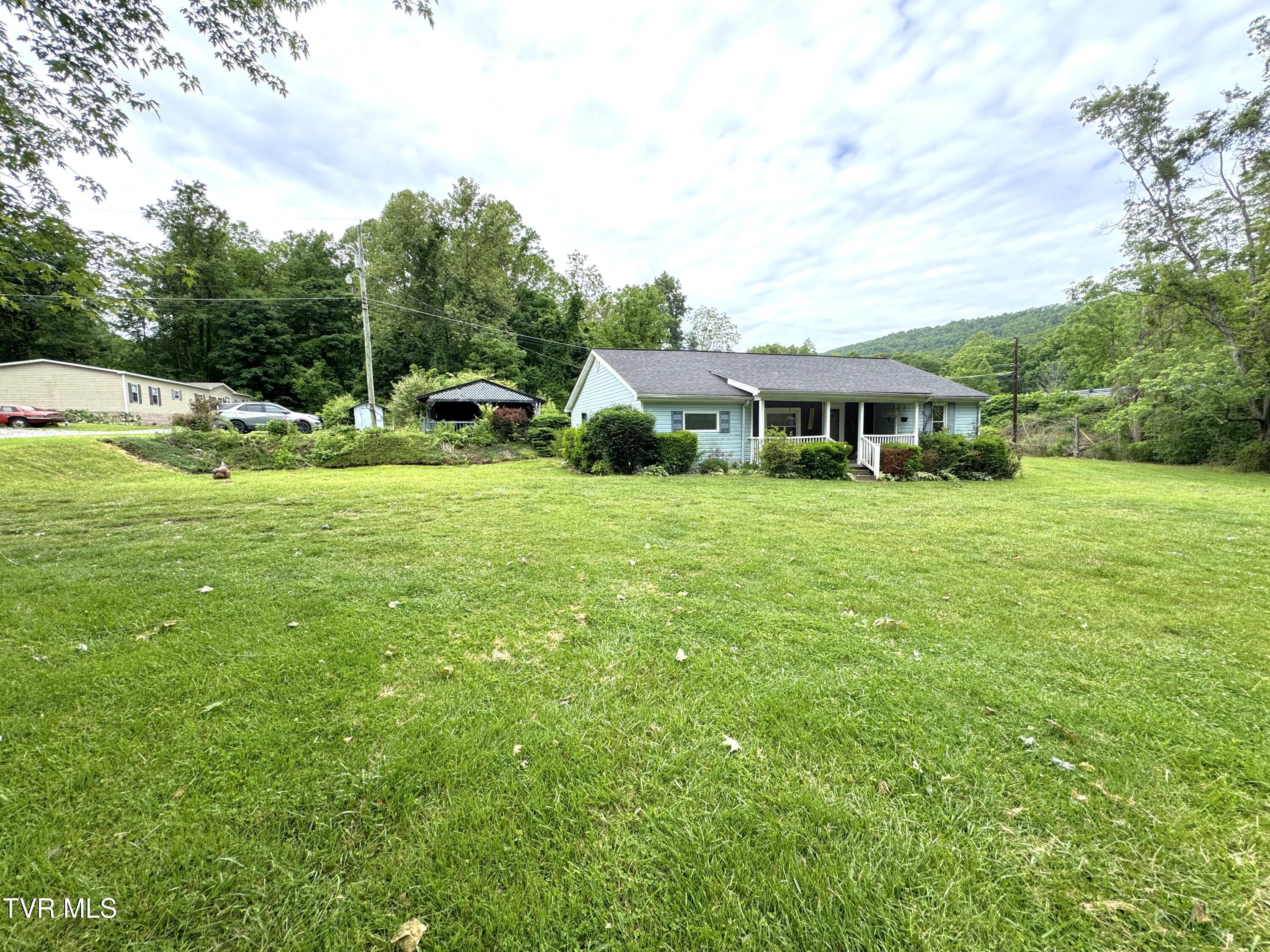 142 Sheryl Turner Road Big Stone Gap, VA 24219 - Photo 39 of 42 RIGHT FRONT CORNER WITH LOT