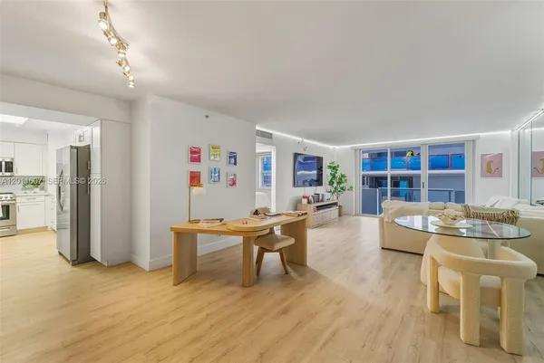 a living room with furniture and a table