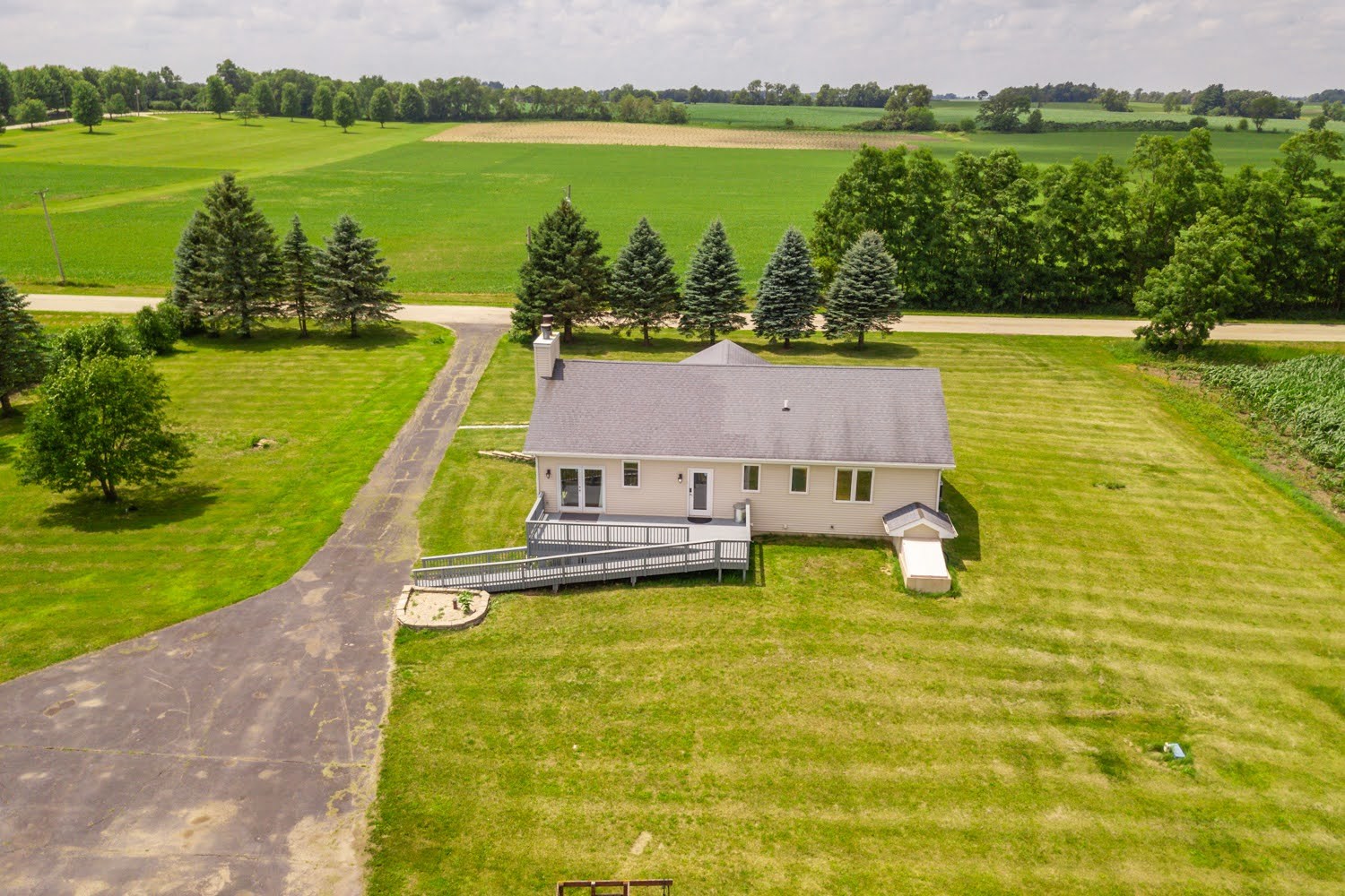 16649 Beaverton Road Capron, IL 61012 - Photo 39 of 48 a aerial view of a house with a ocean view