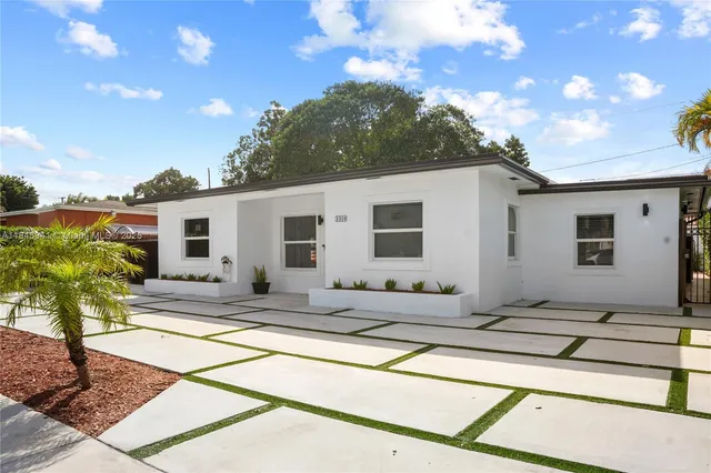a house view with a outdoor space