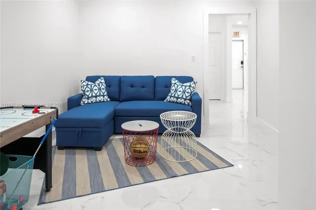 a living room with furniture and a couch