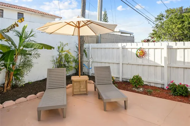 a building outdoor space with patio furniture