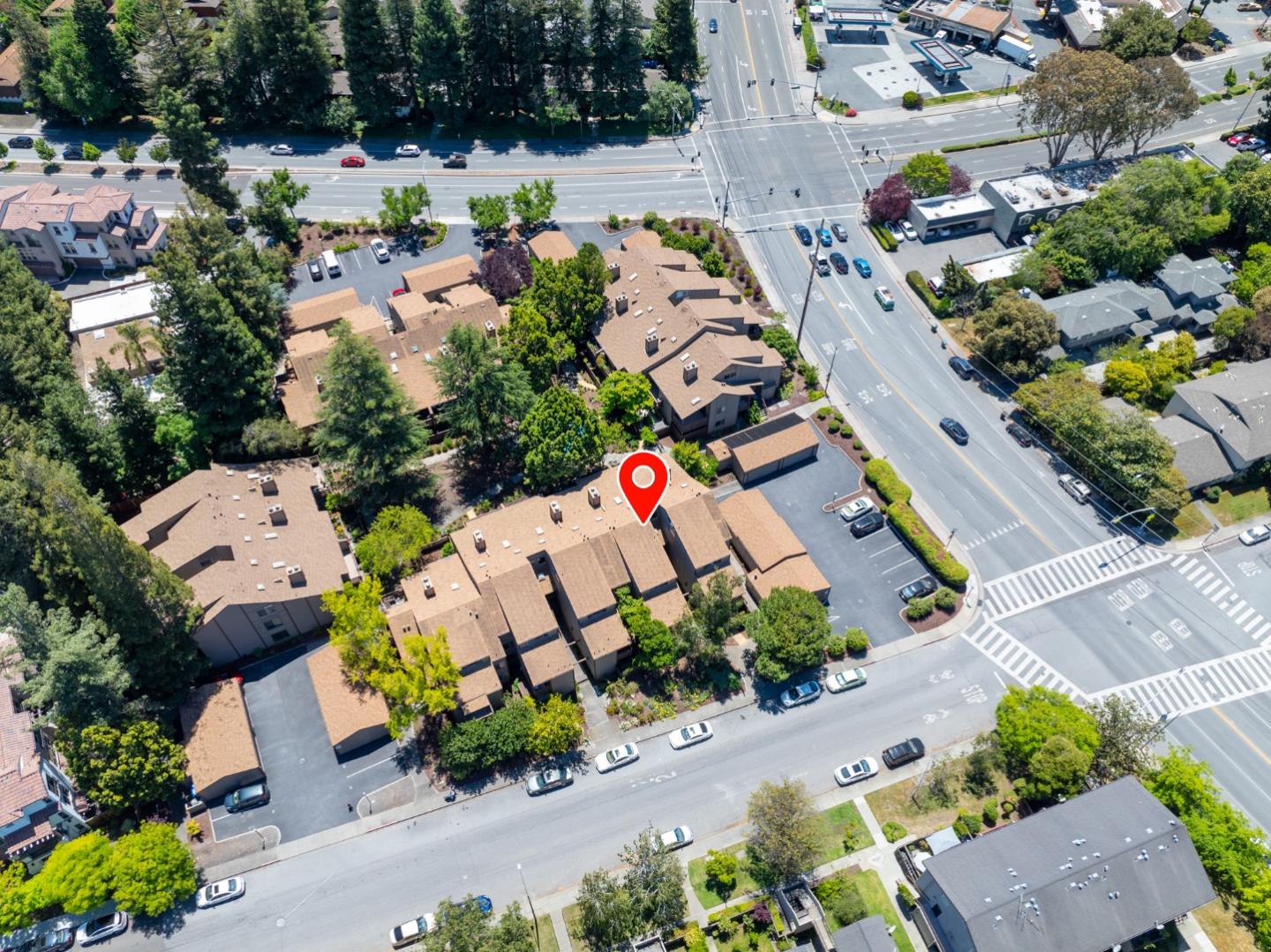 2040 West Middlefield Road, Unit 12 Mountain View, CA 94043 - Photo 23 of 24 an aerial view of a house with a yard and garden