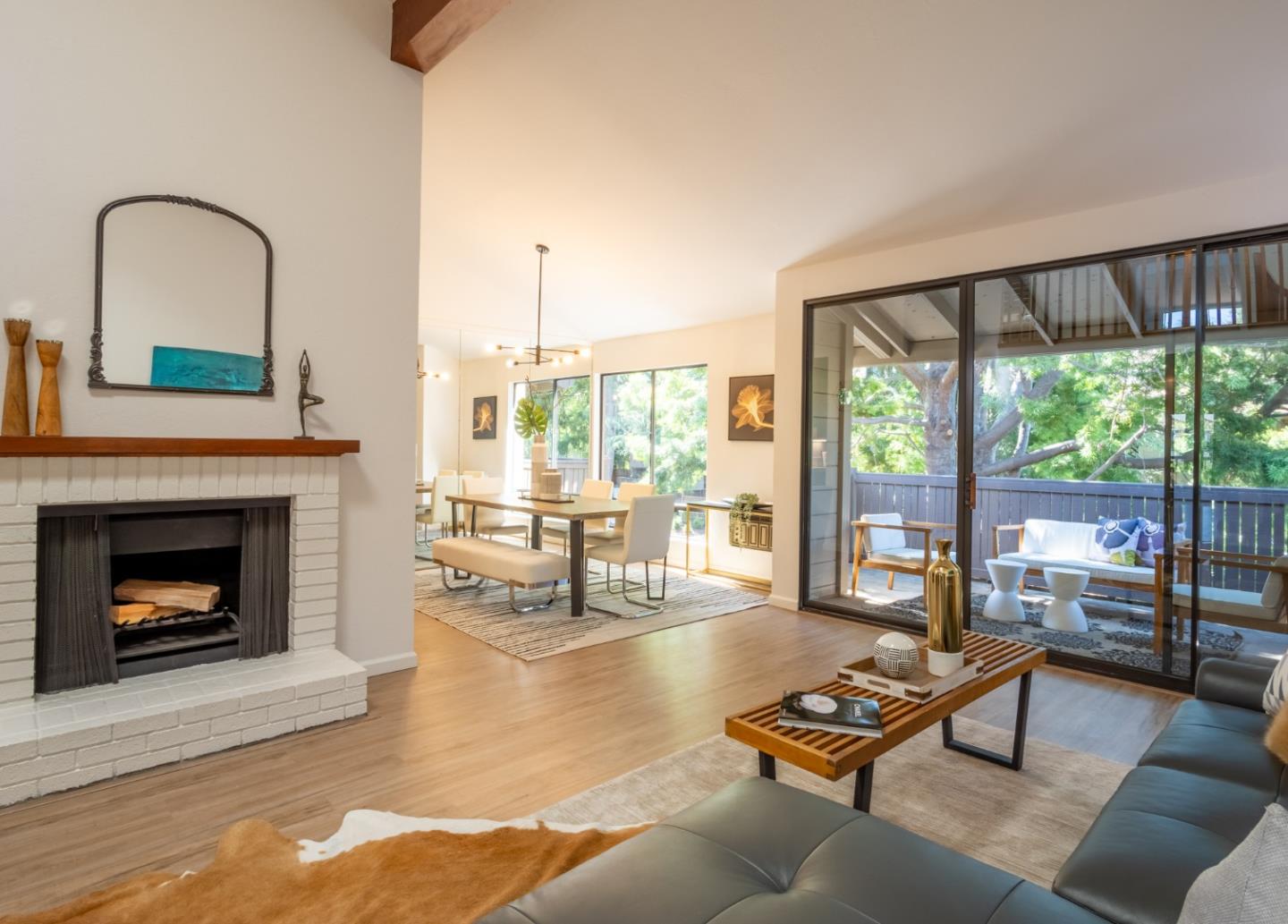 2040 West Middlefield Road, Unit 12 Mountain View, CA 94043 - Photo 3 of 24 a living room with furniture and a fireplace