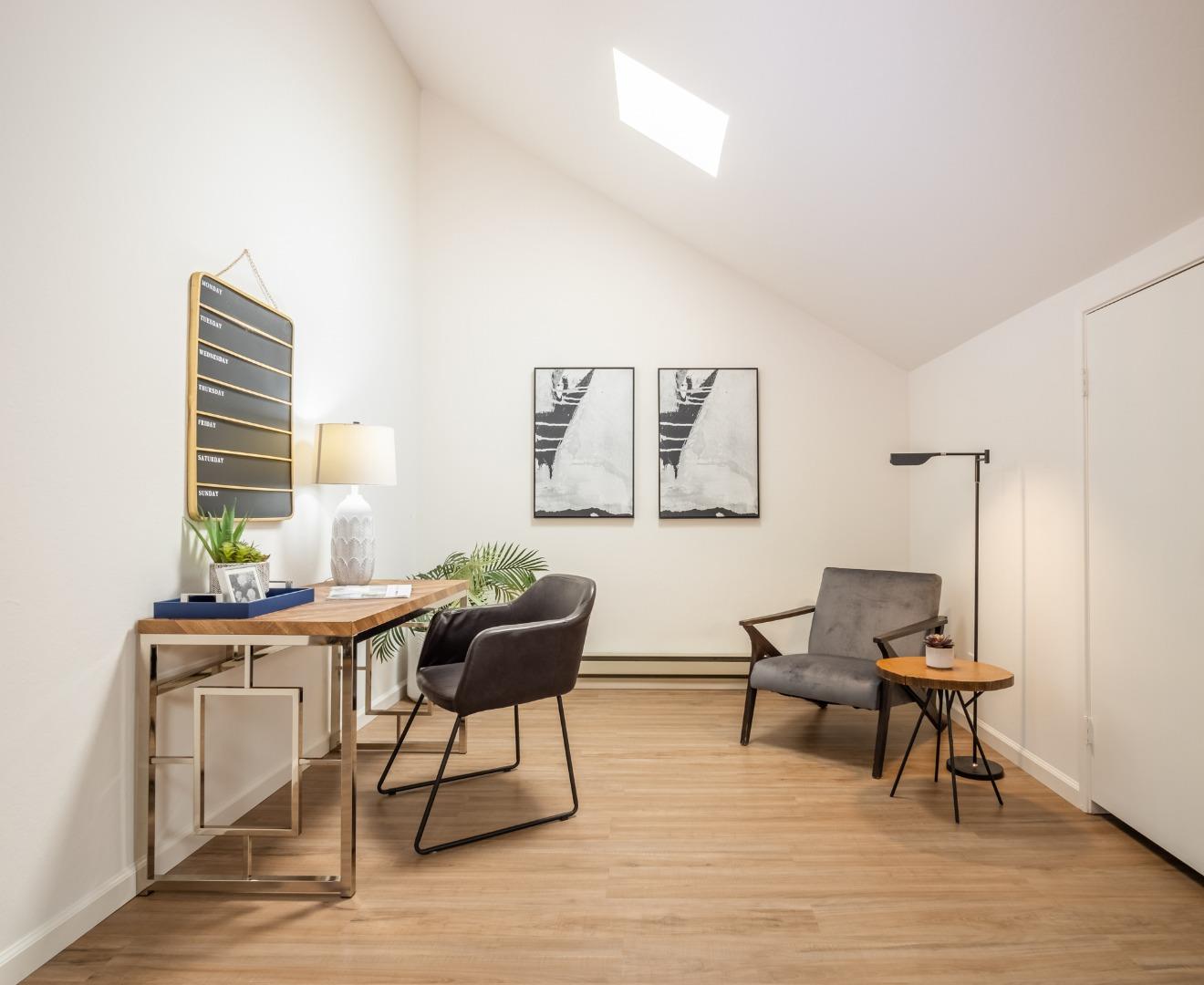 2040 West Middlefield Road, Unit 12 Mountain View, CA 94043 - Photo 9 of 24 a workspace with furniture and wooden floor