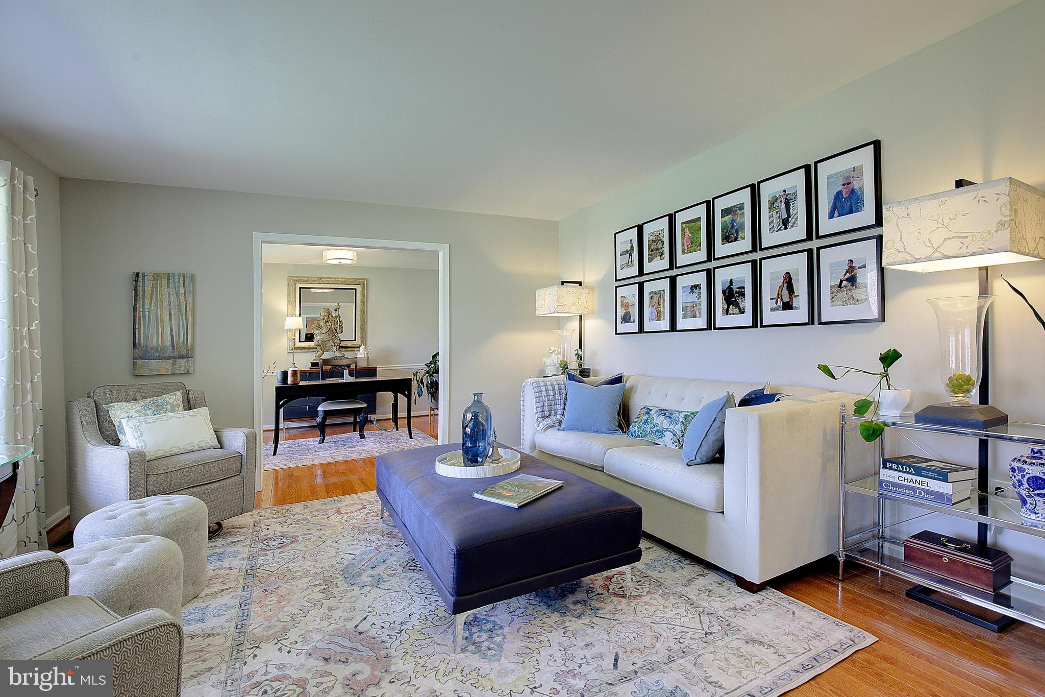 3050 Hickory Ridge Road Dunkirk, MD 20754 - Photo 11 of 78 a living room with furniture and a book shelf