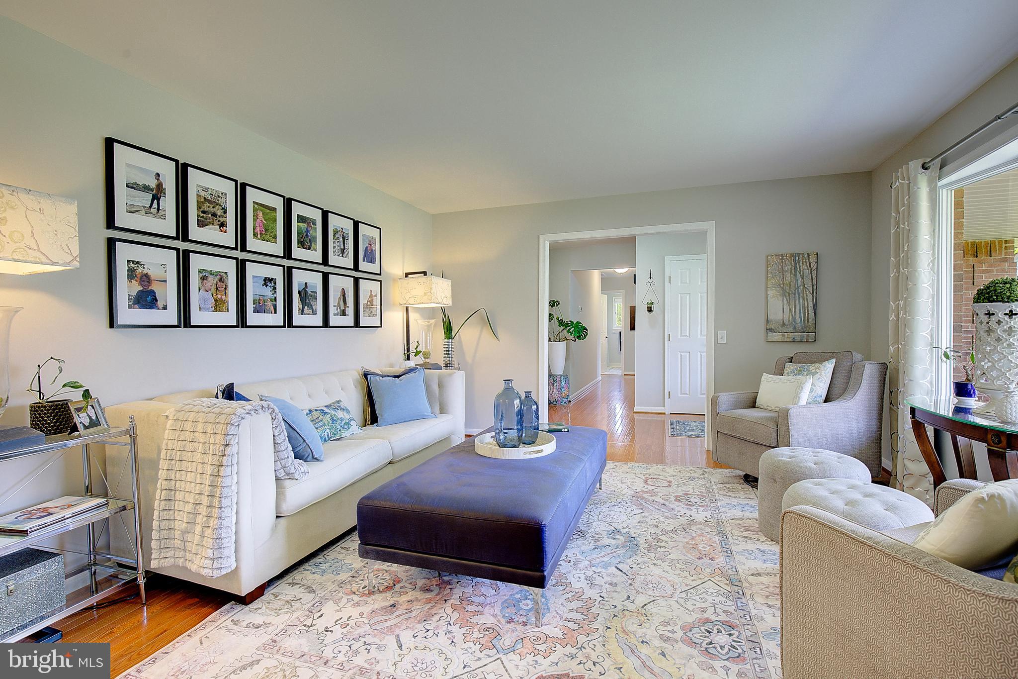 3050 Hickory Ridge Road Dunkirk, MD 20754 - Photo 13 of 78 a living room with furniture and a book shelf