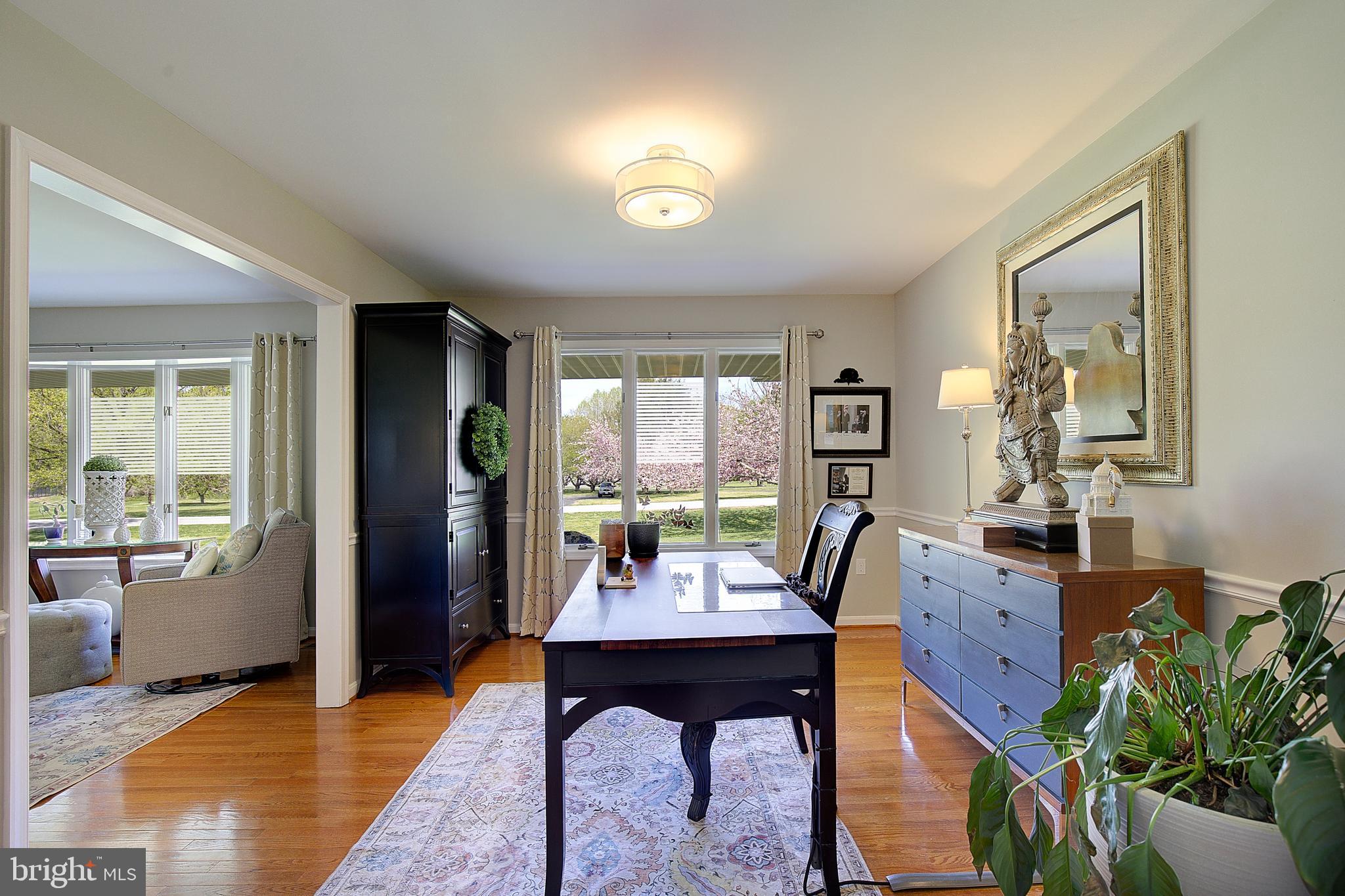 3050 Hickory Ridge Road Dunkirk, MD 20754 - Photo 15 of 78 a view of a dining room with furniture window and outside view