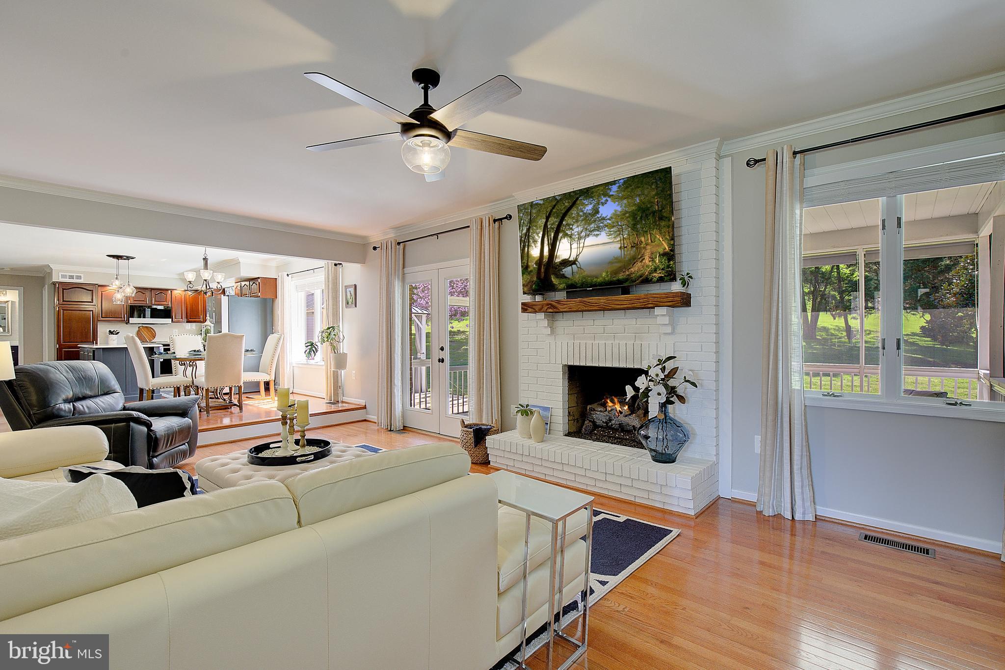 3050 Hickory Ridge Road Dunkirk, MD 20754 - Photo 30 of 78 a living room with furniture and a fireplace