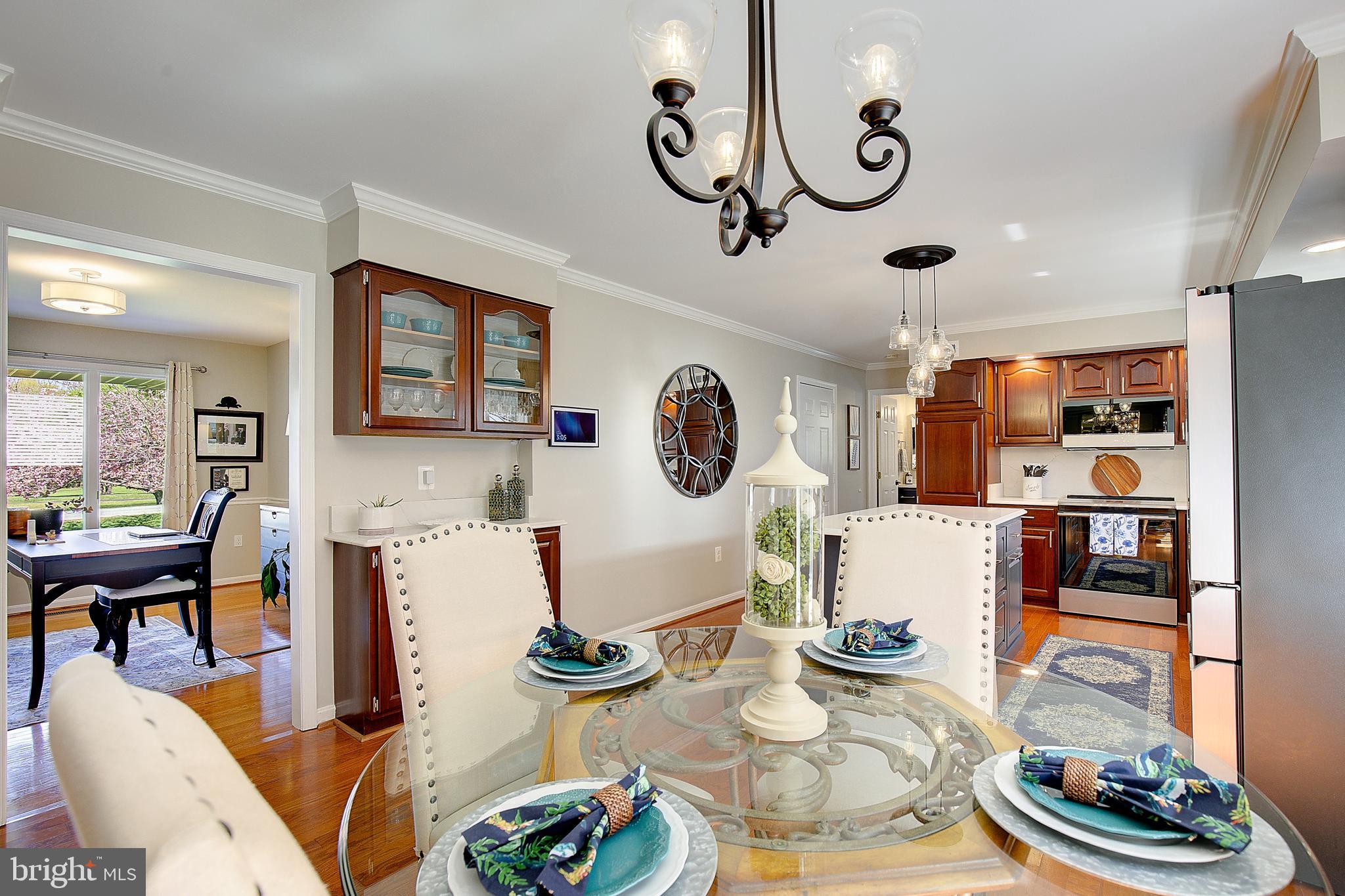3050 Hickory Ridge Road Dunkirk, MD 20754 - Photo 35 of 78 a living room with lots of furniture and white walls