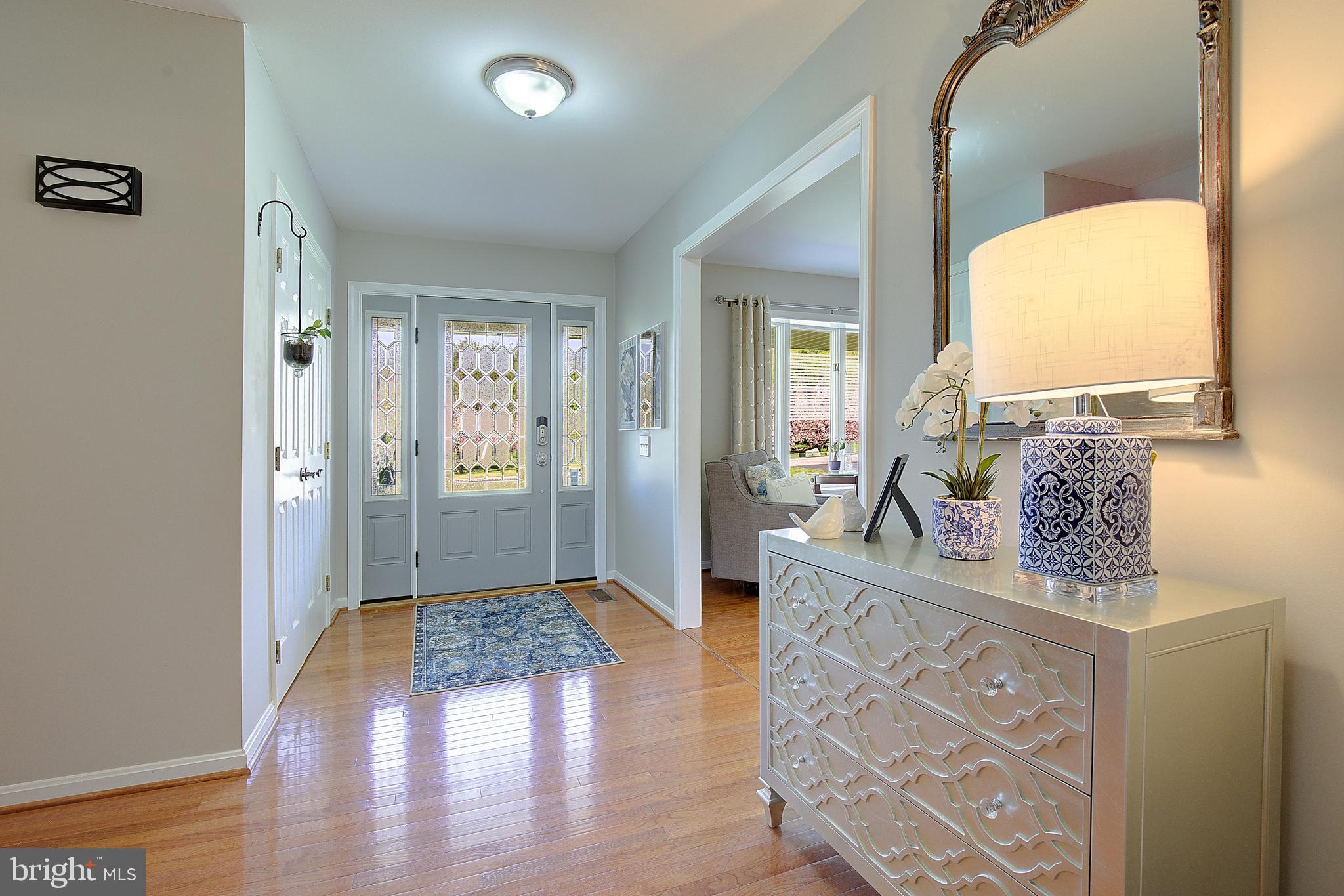 3050 Hickory Ridge Road Dunkirk, MD 20754 - Photo 9 of 78 a living room with furniture and a fireplace