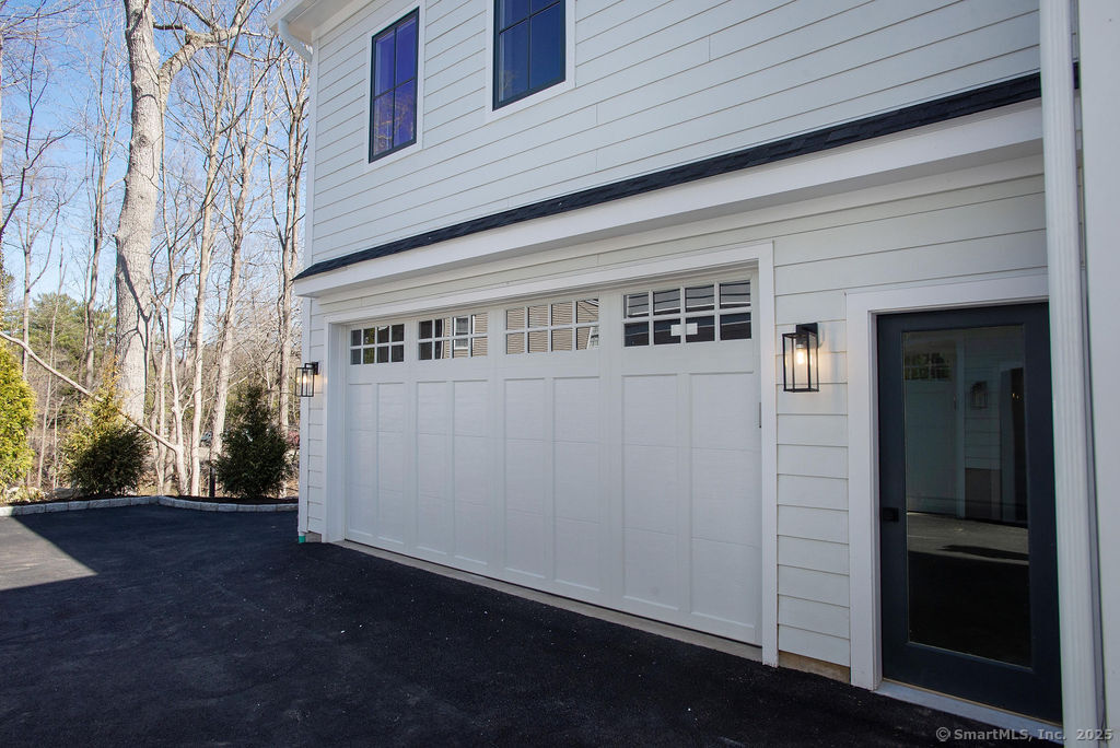 6 Down River Road, Unit B New Canaan, CT 06840 - Photo 33 of 39 Two Car Garage and Side Door Entrance